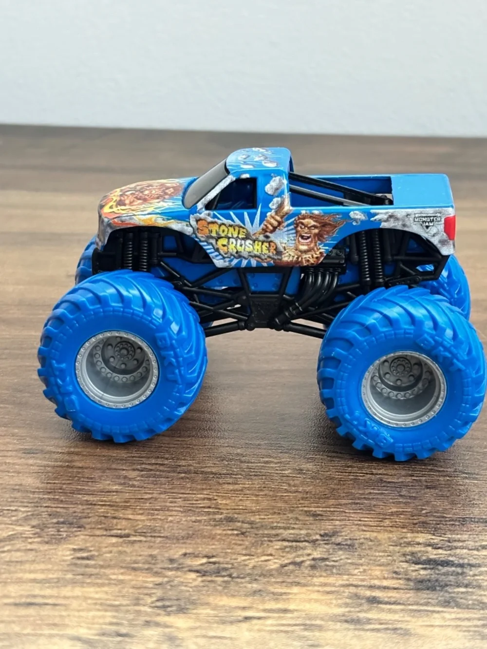 Monster Jam 1:64 Stone Crusher Gray Blue Tires 2023 Monster Truck Die Cast Metal